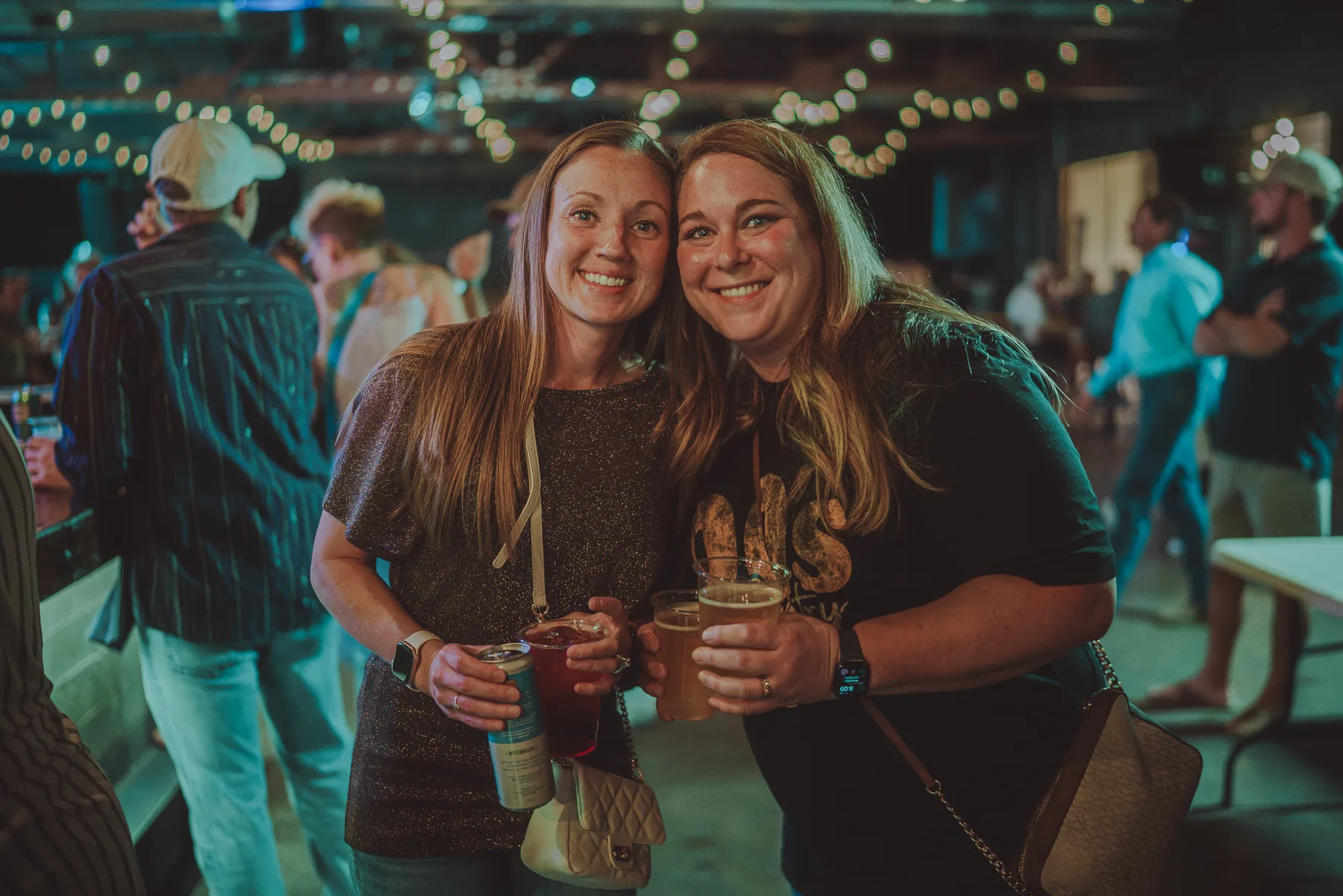 Friends enjoying drinks during a night at The Gaslight Social